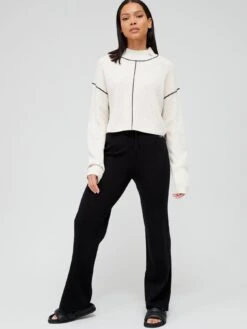 Calvin Klein Jeans Knitted Loose Sweater - Beige 8 Calvin Klein Jeans Knitted Loose Sweater - Beige -Modish Muse VGTRI SQ3 0000000108 BEIGE MDo